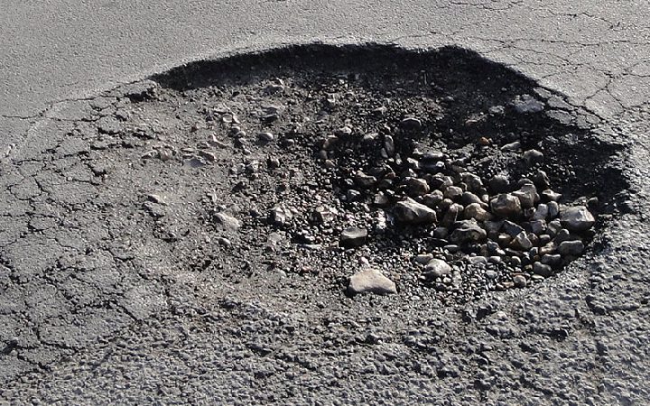 https://www.oktire.com/blog/2018/04/09/minimize-pothole-damage-this-season/